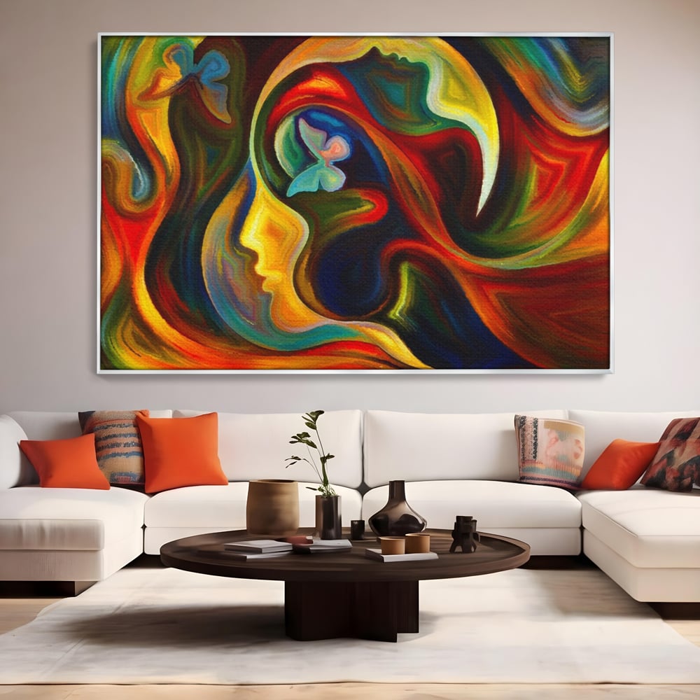 Tablou canvas cu pictura abstracta cu profil uman si fluturi, in rama de aluminiu argintiu, pe perete intr-un living